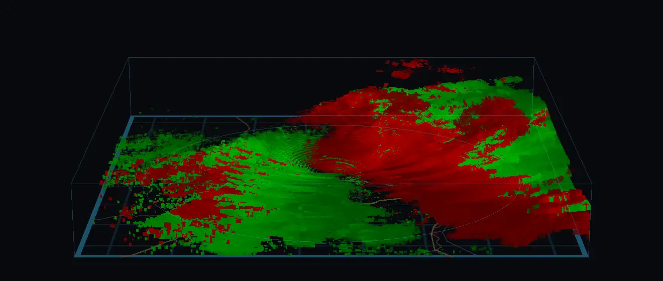 Radar velocity in three dimensions over St. Louis: air moving toward the radar in green and away from it in red, standing as solids above the map.